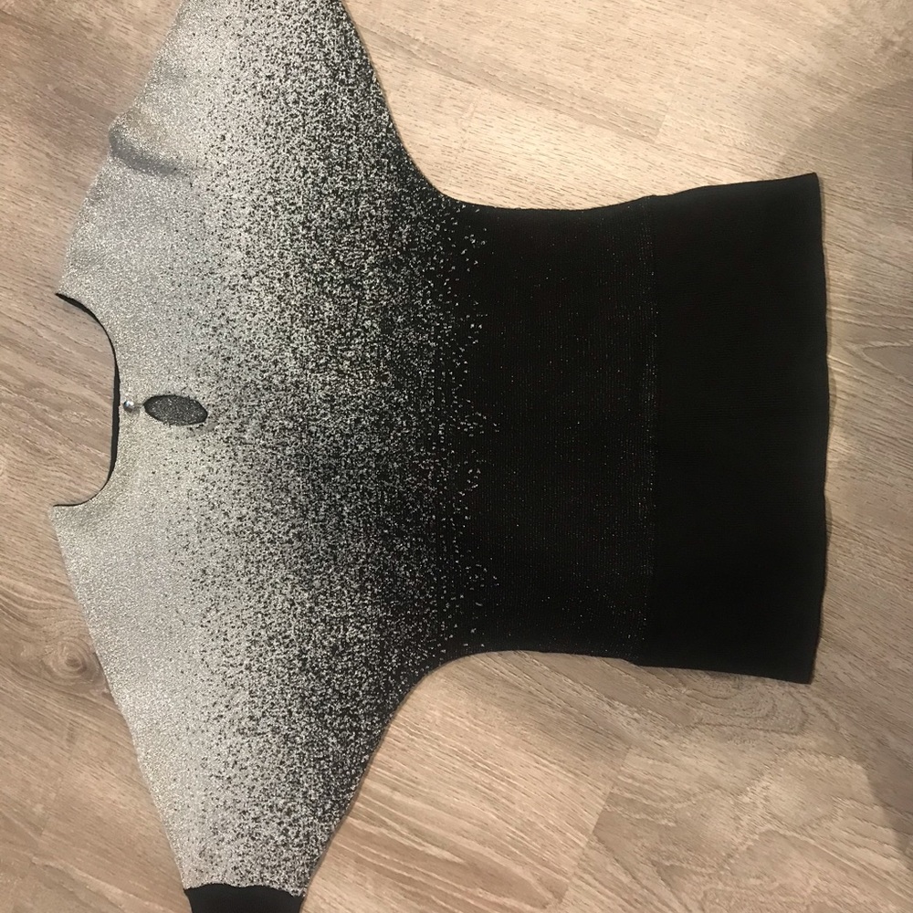 Two-tone black and silver form fitting sweater